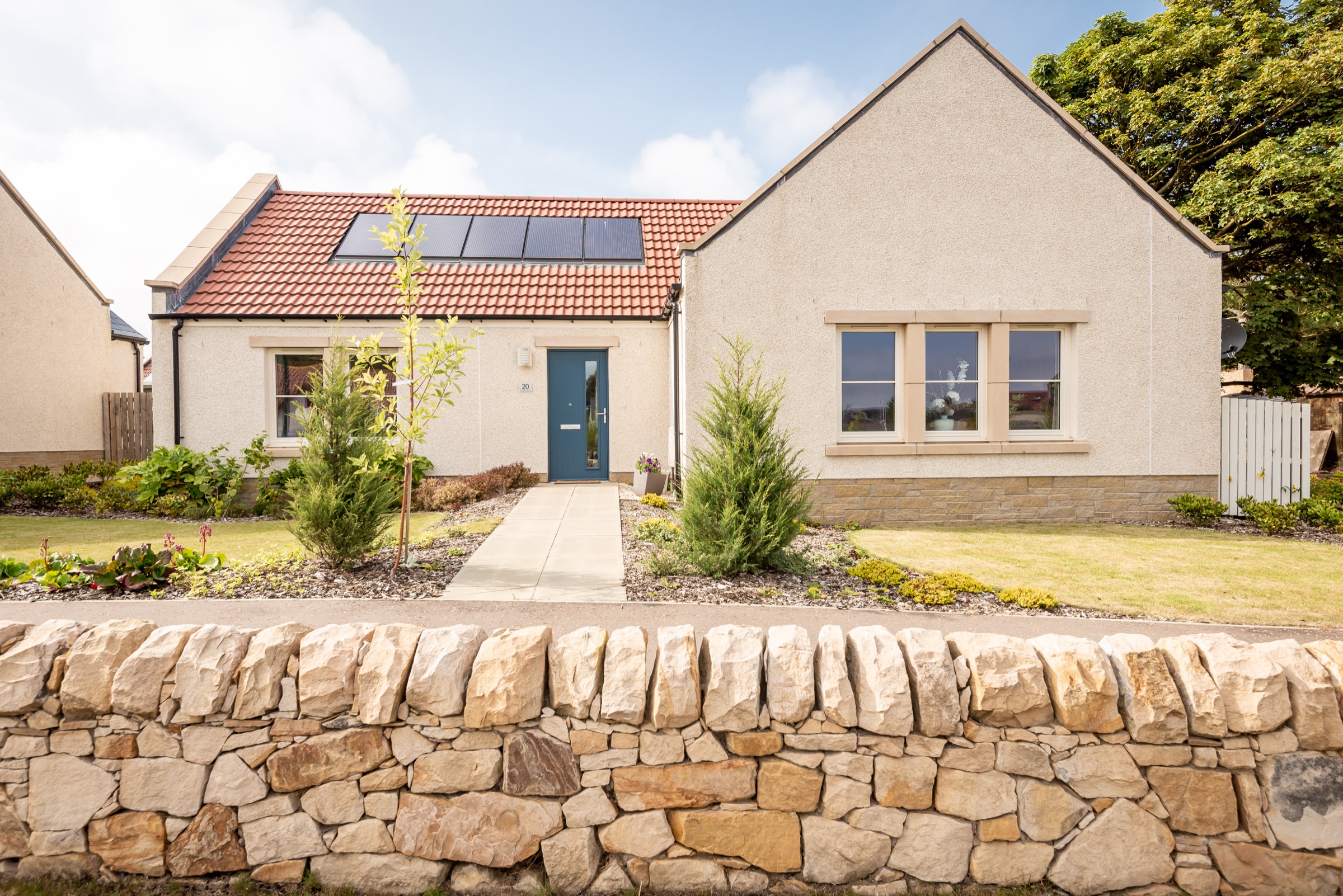 Front exterior of Dormie House, a modern holiday cottage in Kingsbarns, Fife