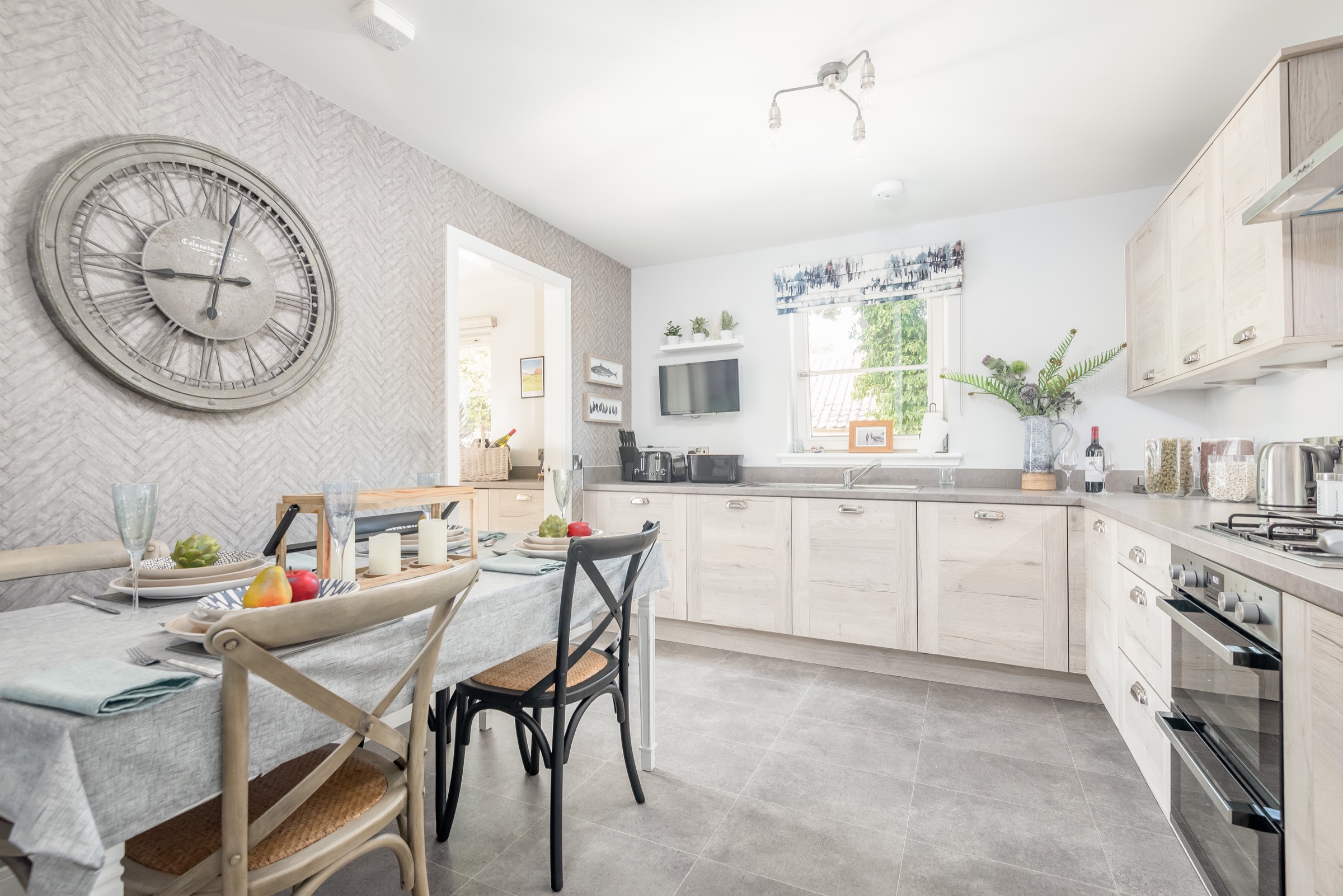 Modern kitchen and dining area at Dormie House