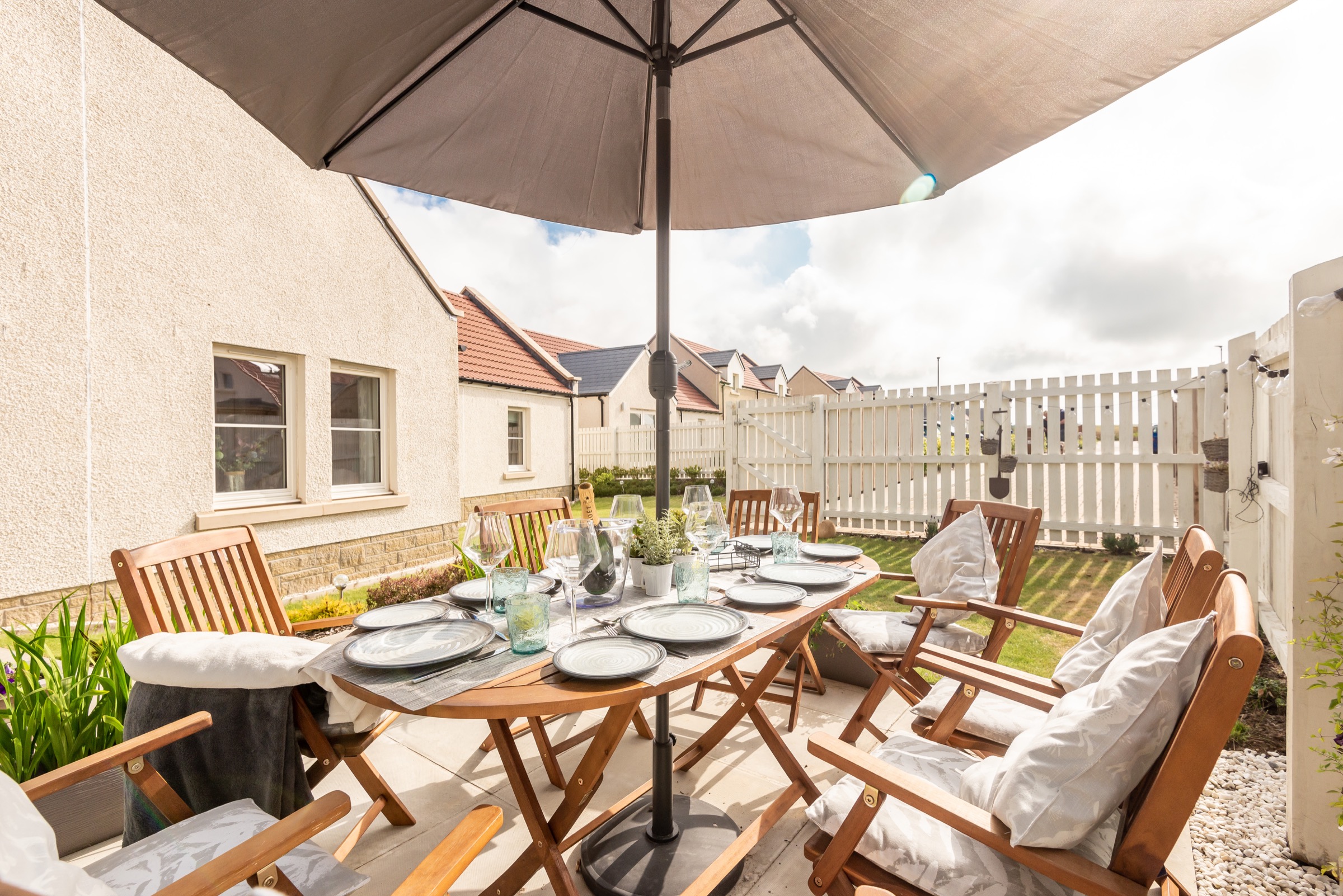 Outdoor decking at Dormie House set up for al fresco dining